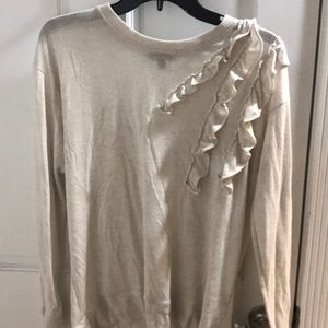 Cream sweater with ruffles